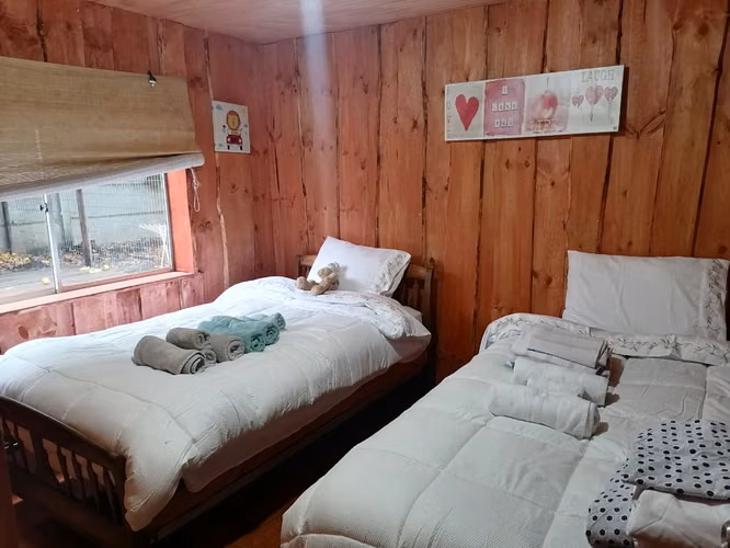 GRAN OPORTUNIDAD VENTA PARCELA CON CASA PRINCIPAL Y CABAÑAS