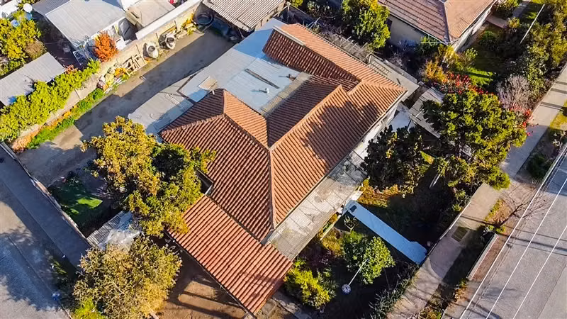 Terreno amplio con proyección comercial con casa Puente Alto