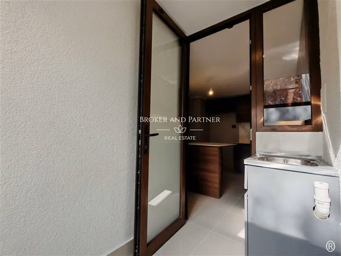 DEPARTAMENTO Marchant Pereira con Dario Urzua