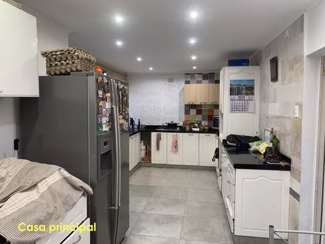 PROPIEDAD CON 2 CASAS, 6 DORM, 4 B, 900M METRO PUDAHUEL