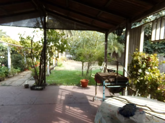 Sitio con casa en venta en centro Talagante