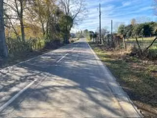 Mune Alto, terreno orilla camino asfaltado
