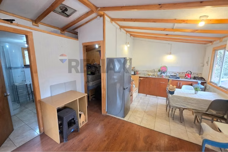 Parcela en pirque con bajada al río y 3 casas