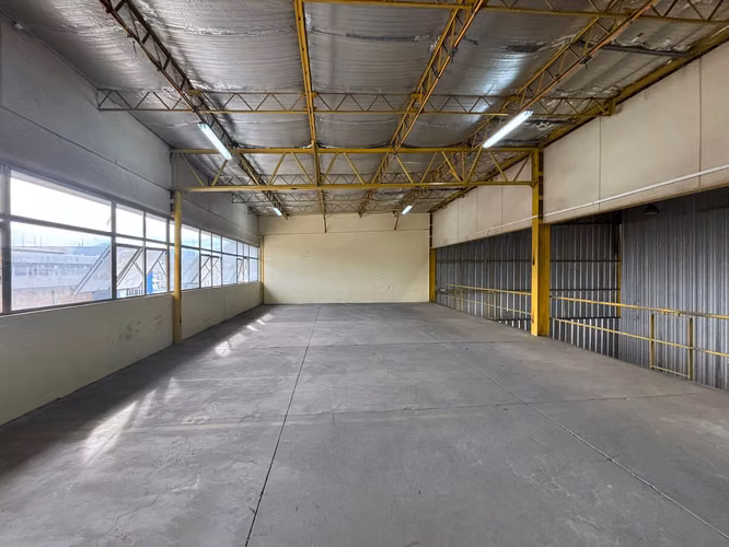 BODEGA CON ANDENES EN QUILICURA, ACCESO PANAMERICANA NORTE