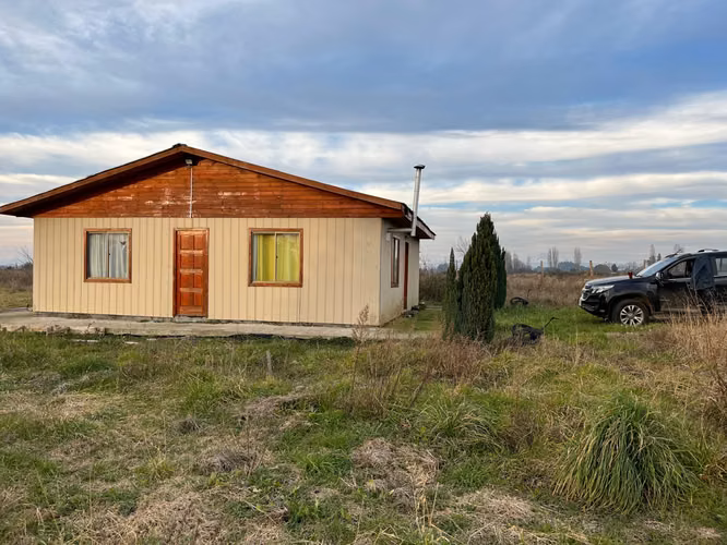 PARCELA CON CASA  Y RIEGO CAMINO A CERRO COLORADO LOS ÁNGELES