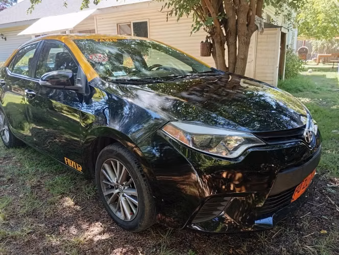 Taxi Toyota Corolla