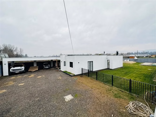 Parcela en arriendo 1.000 con casa en Paine