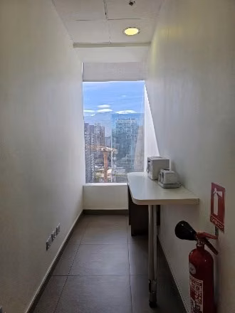 OFICINA Rosario Norte con Cerro El plomo