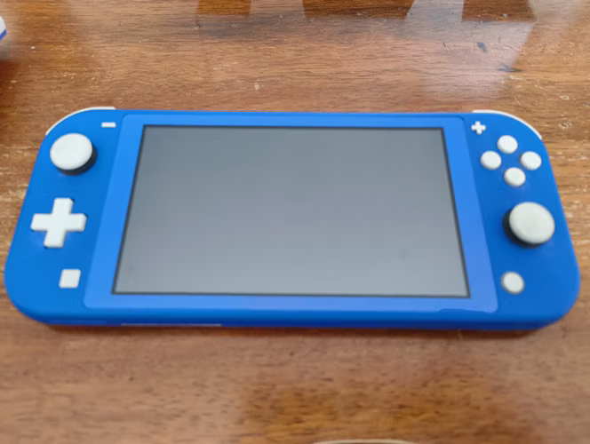 Nintendo Switch Lite + 2 juegos