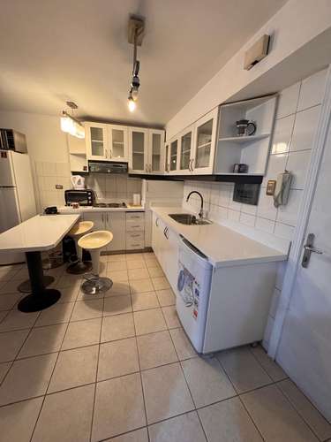 Amplio Loft en Sto. Centro, 57 m², Cocina Nueva + Estac. y Bodega – UF 3.100