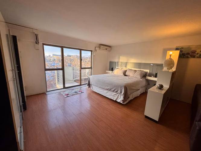 Studio/Loft 57 m² Remodelado, Balcón con Vista Panorámica – Santiago Centro