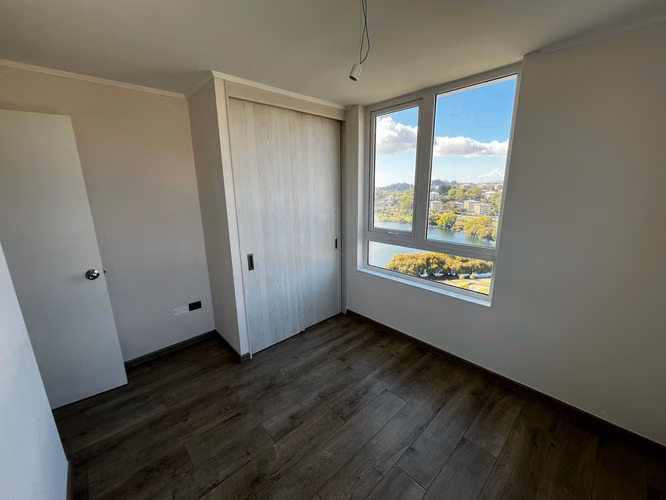 ARRIENDO DP 2 DORMITORIO 1 BAÑO EDIFICIO LAGUNA ORIENTE