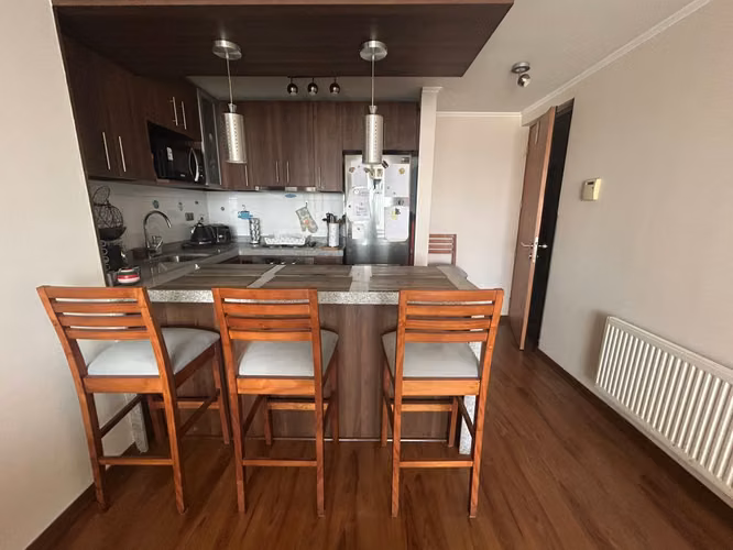 Agradable departamento central, 2 dormitorios, 2 baños, estacionamiento y bodega