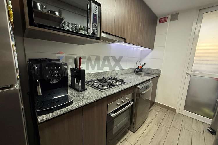 Impecable departamento en condominio - la reina