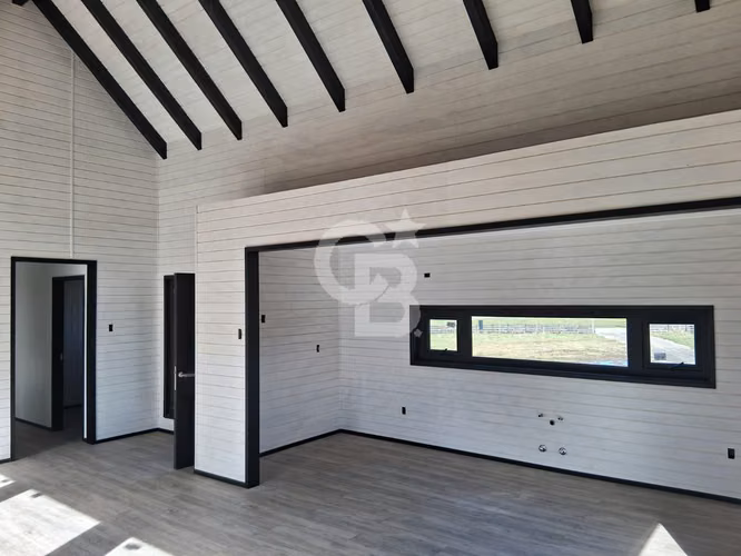 Moderna Casa con Vista a Volcanes y Amplia Terraza
