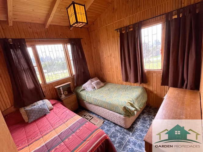 Parcela de 5.010 m² con 2 Casas, Piscina y Agua Potable – Condominio Santa Eliana, Melipilla