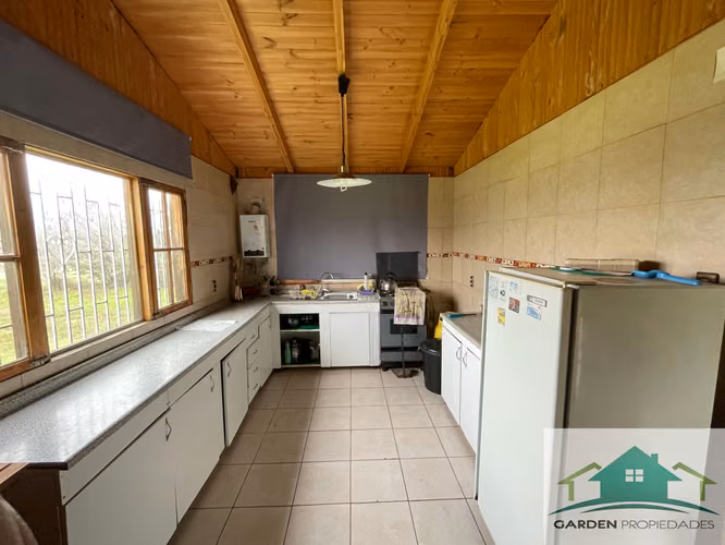 Parcela de 5.010 m² con 2 Casas, Piscina y Agua Potable – Condominio Santa Eliana, Melipilla