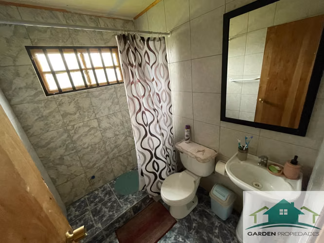 Parcela de 5.010 m² con 2 Casas, Piscina y Agua Potable – Condominio Santa Eliana, Melipilla