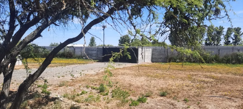 Se vende lote con Rol, sector los Leones frente a Unifrutti,