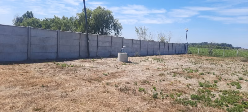 Se vende lote con Rol, sector los Leones frente a Unifrutti,