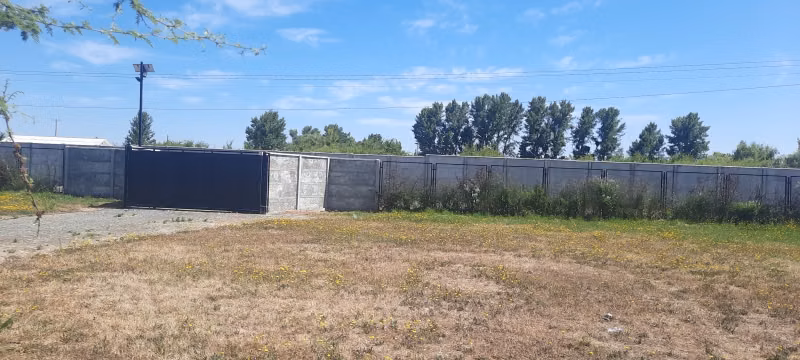 Se vende lote con Rol, sector los Leones frente a Unifrutti,