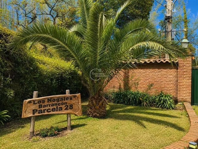Lado camino Calera deTango 2.372 m2 condominio habitacional