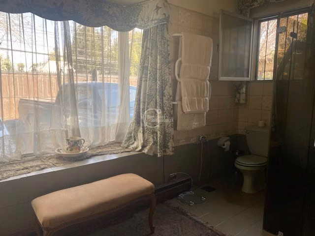 Casa en venta de 6 dorm. en Vitacura