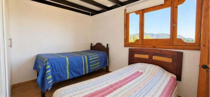 En venta, parcela de 5.000 m2., con casa de 2 dormitorios, en El Melón, Nogales.  100 M$