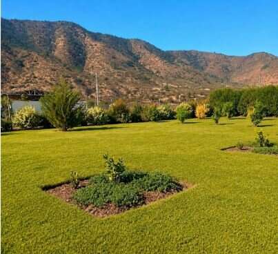 En venta, parcela de 5.000 m2., con casa de 2 dormitorios, en El Melón, Nogales.  100 M$