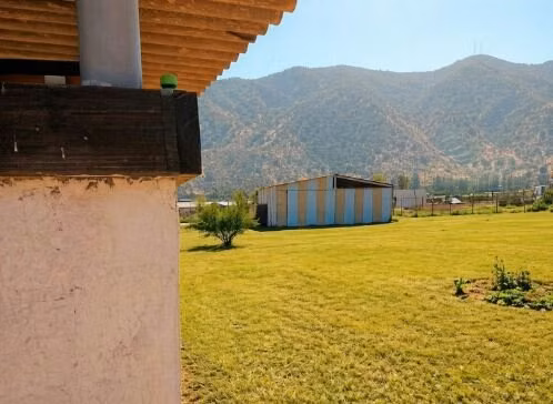 En venta, parcela de 5.000 m2., con casa de 2 dormitorios, en El Melón, Nogales.  100 M$