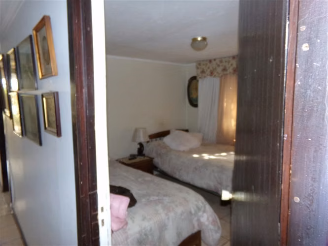 Sitio con casa en venta en centro Talagante