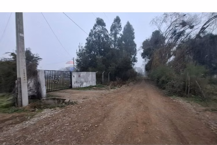 Venta parcela con casa en parral