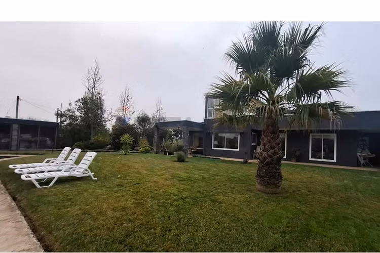 Venta parcela con casa en parral