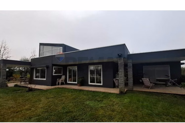 Venta parcela con casa en parral