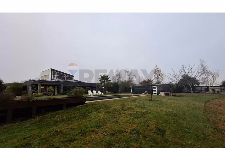 Venta parcela con casa en parral