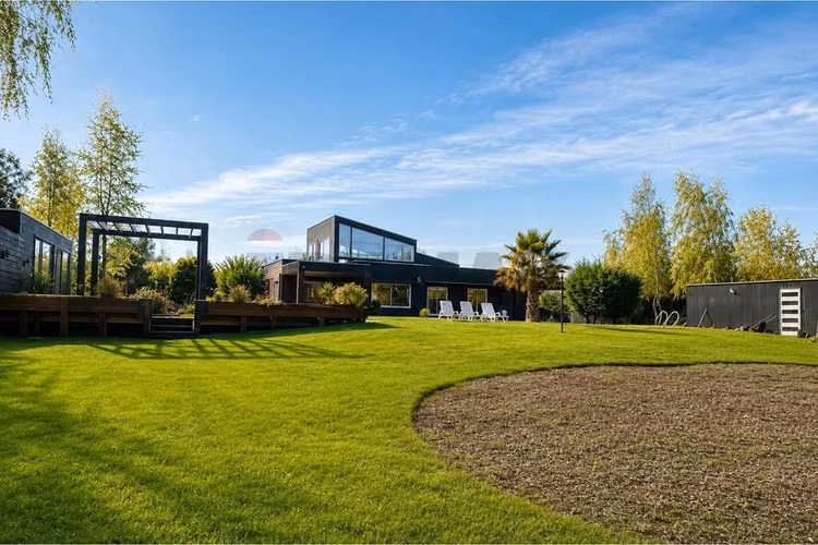 Venta parcela con casa en parral