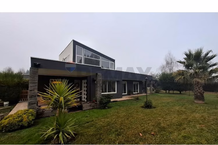 Venta parcela con casa en parral