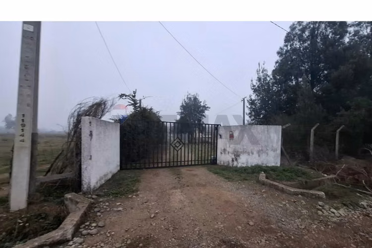 Venta parcela con casa en parral