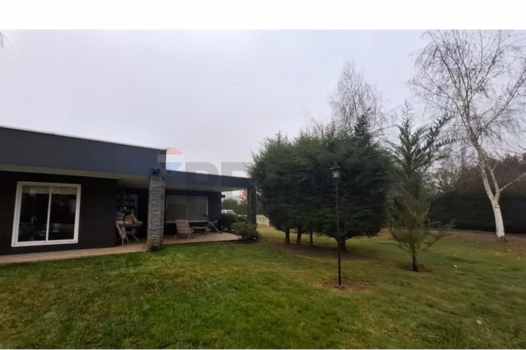 Venta parcela con casa en parral