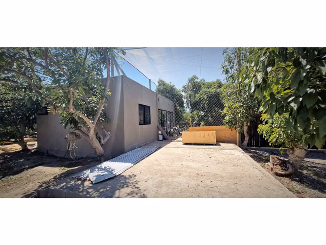 Venta de parcela con casa de 1 dormitorio, en Condominio exclusivo en La Cruz. 5.857 UF.