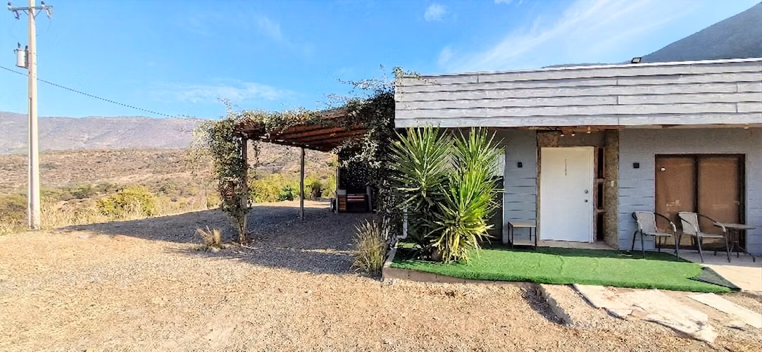 Venta de hermosa parcela de 6.021 m2. con casa y piscina en el tranquilo sector de Lo Rojas, La Cruz. 110 M$.