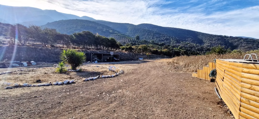 Venta de hermosa parcela de 6.021 m2. con casa y piscina en el tranquilo sector de Lo Rojas, La Cruz. 105 M$.