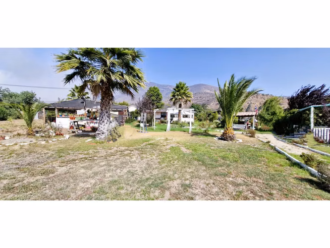 Venta parcela de 18.000 m2., casa, cabaña y galpón, con maquinaria de maestranza, en La Calera. 21.308 UF.