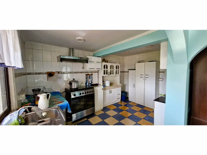 Venta parcela de 18.000 m2., casa, cabaña y galpón, con maquinaria de maestranza, en La Calera. 21.308 UF.