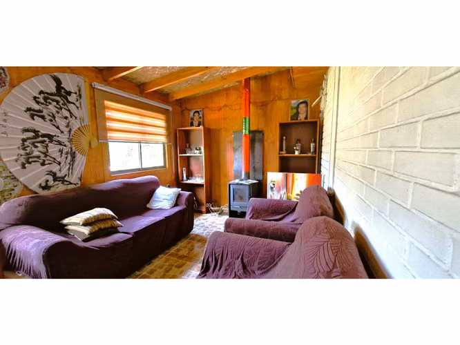 Venta parcela de 18.000 m2., casa, cabaña y galpón, con maquinaria de maestranza, en La Calera. 21.308 UF.