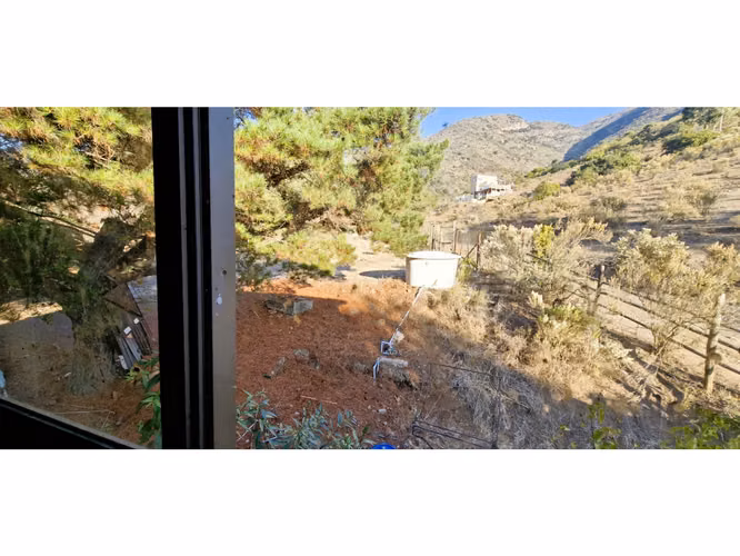 Venta de parcela de 15.000 m2., con casa, quincho y piscina, en Pucalán. 200 M$