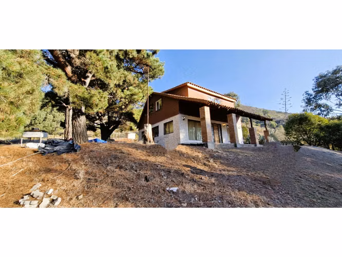 Venta de parcela de 15.000 m2., con casa, quincho y piscina, en Pucalán. 200 M$