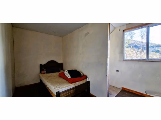 Venta de parcela de 15.000 m2., con casa, quincho y piscina, en Pucalán. 200 M$