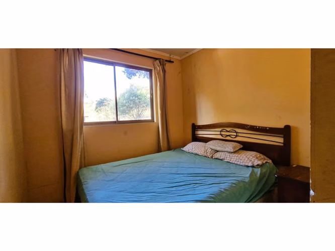Venta de parcela de 15.000 m2., con casa, quincho y piscina, en Pucalán. 200 M$