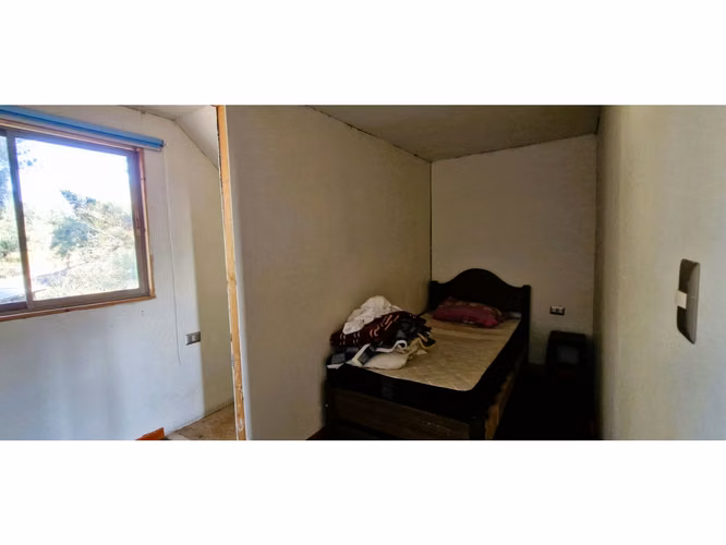 Venta de parcela de 15.000 m2., con casa, quincho y piscina, en Pucalán. 200 M$
